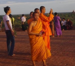 Monks photograph the sunset