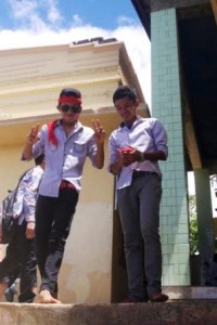 Boy with red scarf