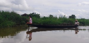loaded boat powered by women