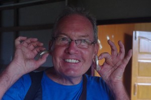 Peter models fish earings
