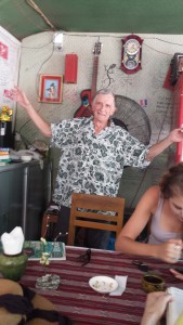 John cools off in front of a giant fan